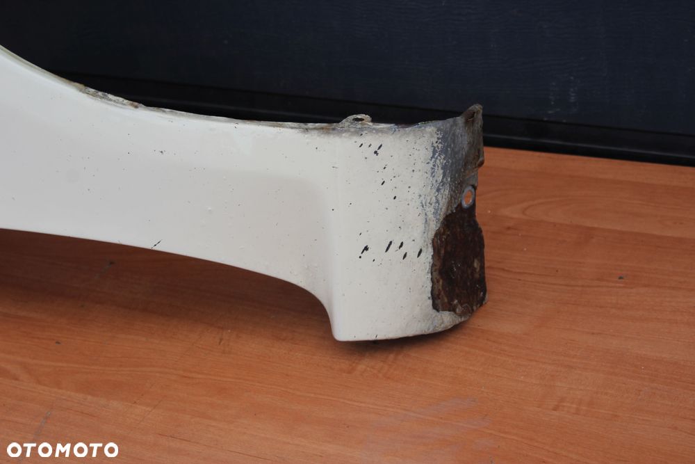 BŁOTNIK PRAWY PRZEDNI OPEL ZAFIRA B Y611 - 9