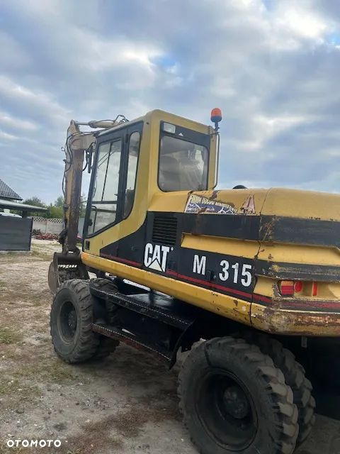 Caterpillar M315 - 4