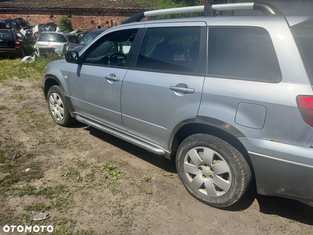 MITSUBISHI OUTLANDER I 01-06 A31 DRZWI PRZÓD TYŁ PRAWE LEWE PODNOŚNIK KLAMKA ZAMEK SZYBA - 1