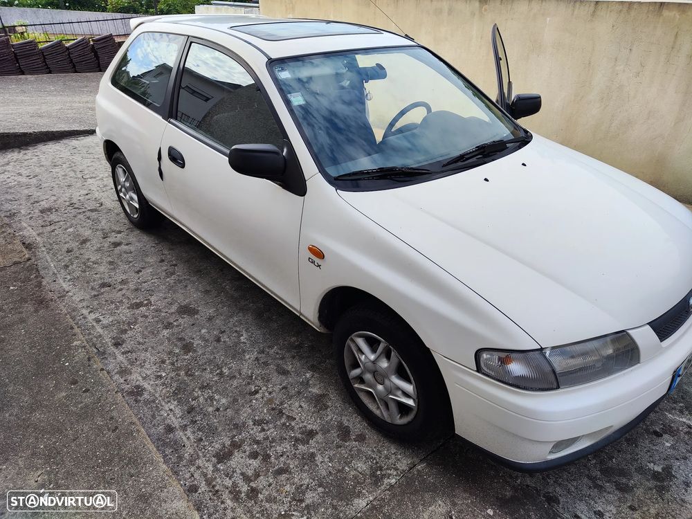 Mazda 323 P 1.3 TA - 9