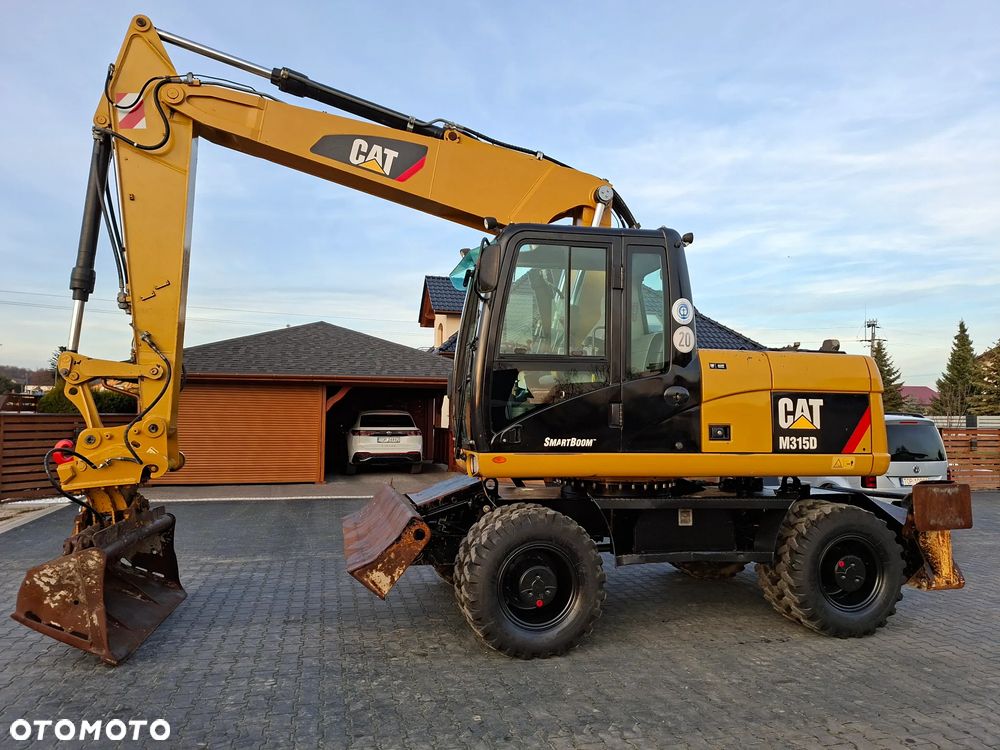 Caterpillar CAT M315D Rok 2011 - 10
