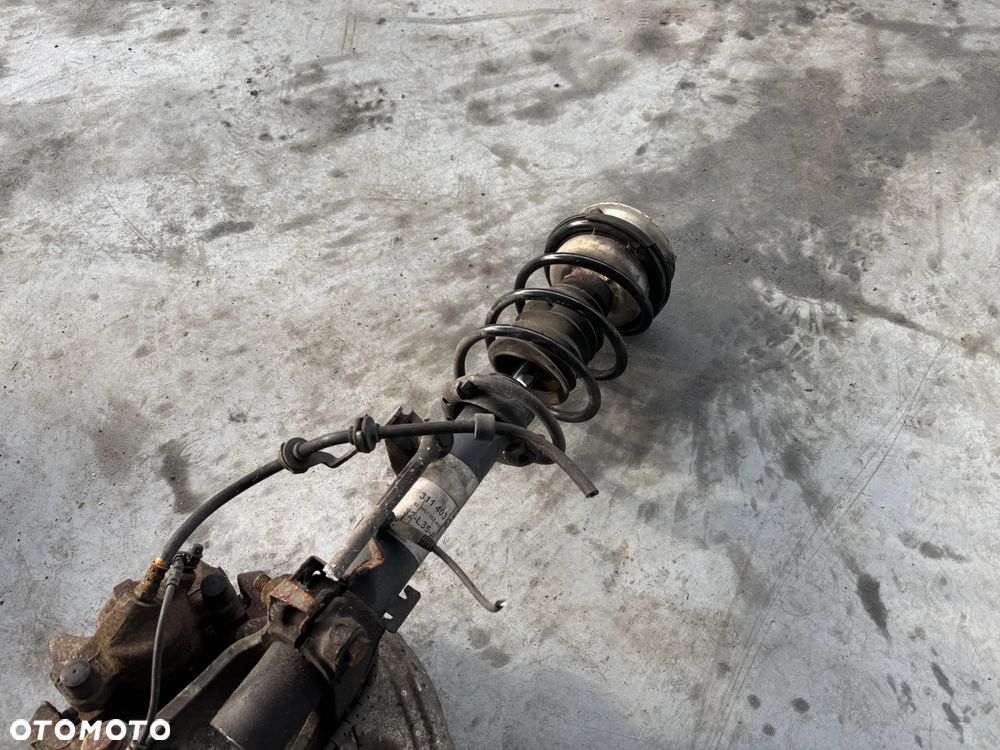 ZWROTNICA AMORTYZATOR LEWY MCPERSON BMW E90 E87 - 9