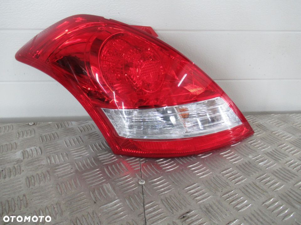LAMPA TYLNA TYŁ LEWA SUZUKI SWIFT MK7 SPORT 2010- - 2
