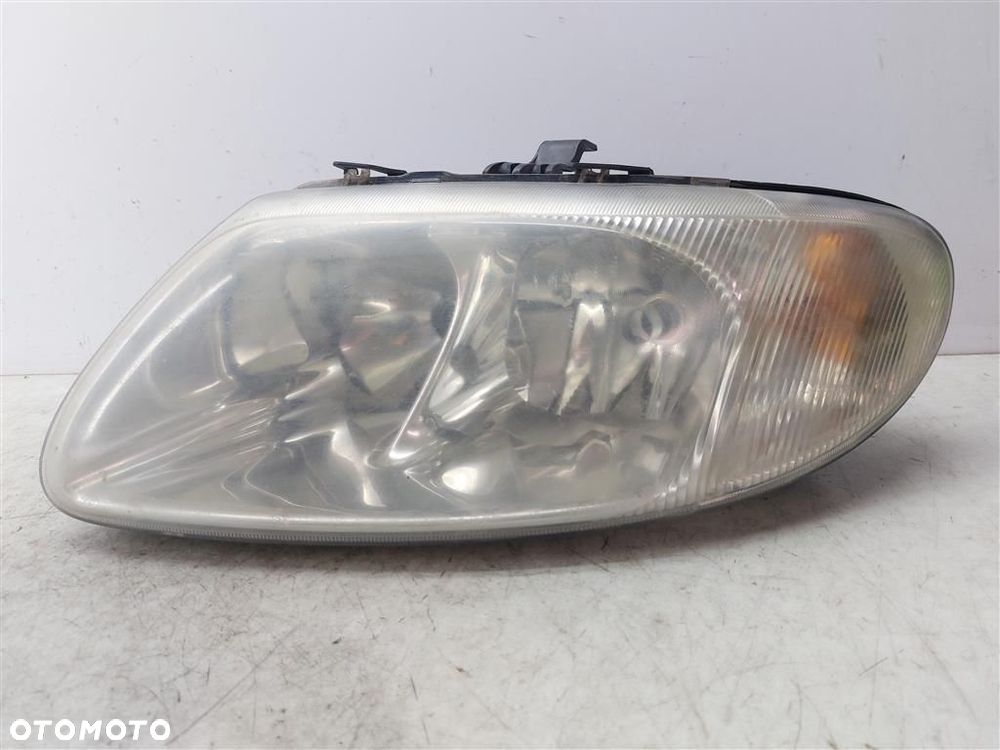 Reflektor lampa przód lewa Chrysler Grand Voyager 04857703AB - 1