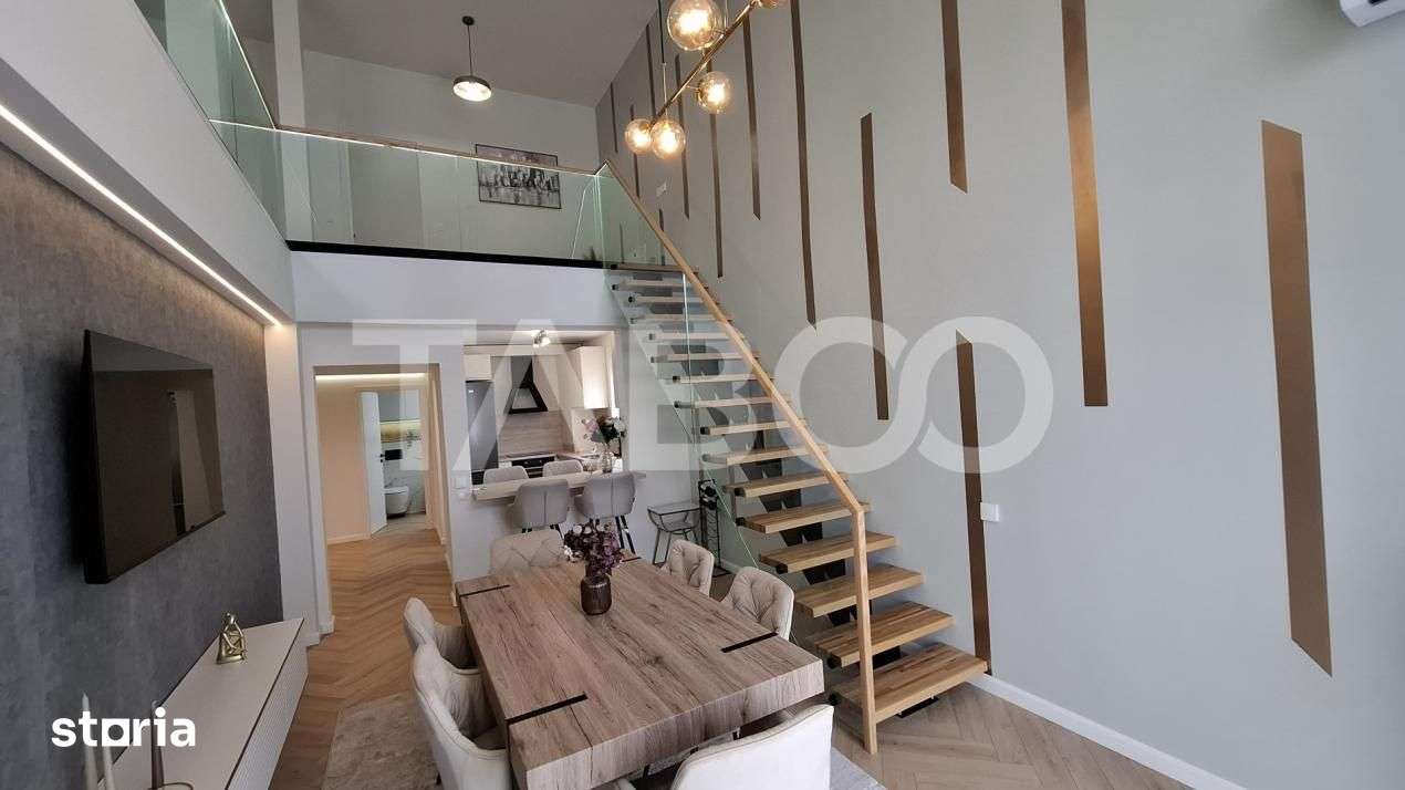 Penthouse lux ultrafinisat dotat si mobilat 2 nivele 131 mp si terasa — fotografia 1
