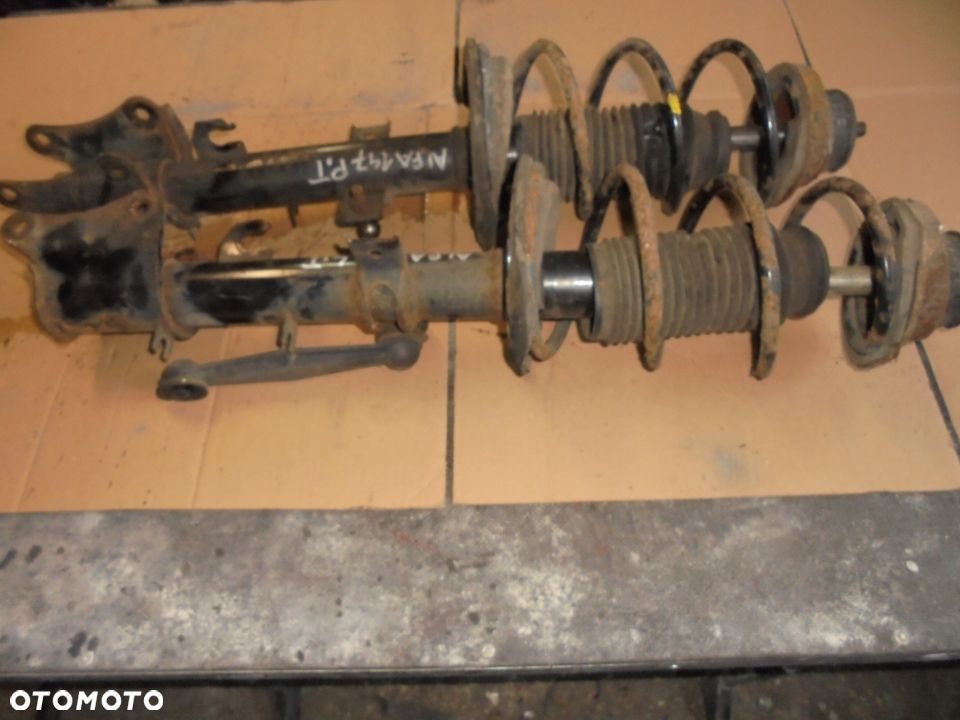 MCPERSON PRAWY LEWY TYL ALFA 147 - 1