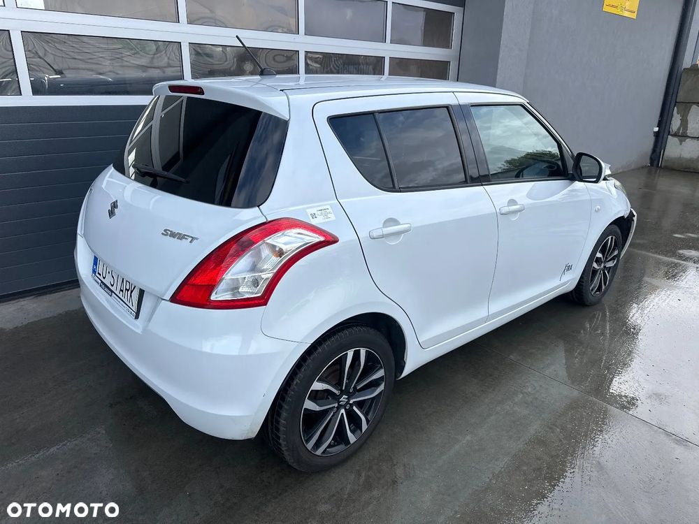 Suzuki Swift 1.2 Premium - 1