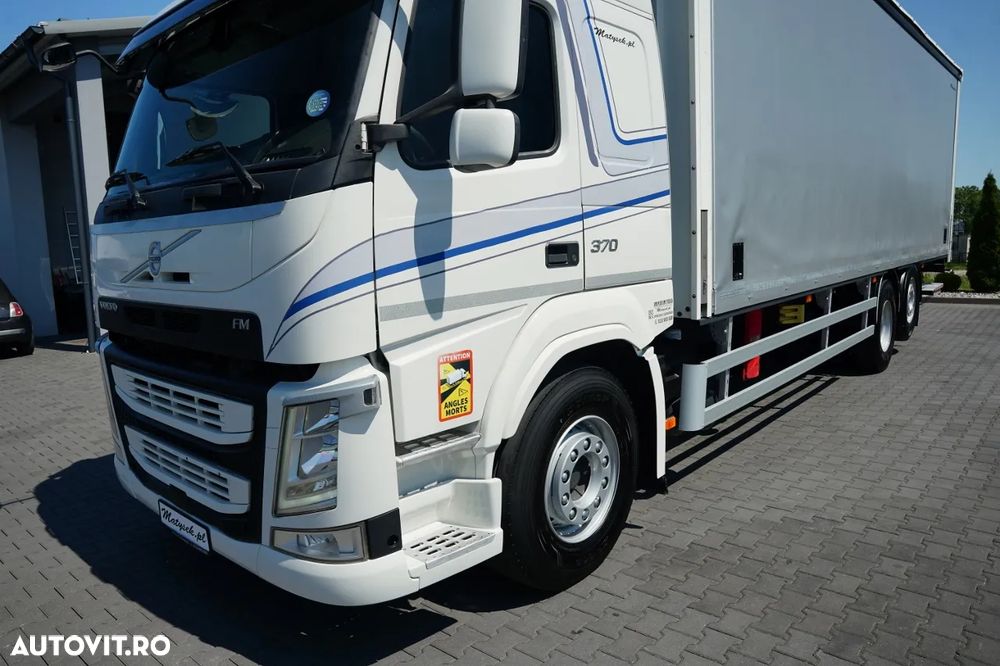 Volvo FM 370 / SOLO / CORTINĂ - 9,1 M / 6X2 / DHOLLANDIA LIFT - 2.000 KG / PODEA REZISTENTĂ / AER CONDIȚIONAT PARCARE / I-SHIFT / EURO 6 - 10