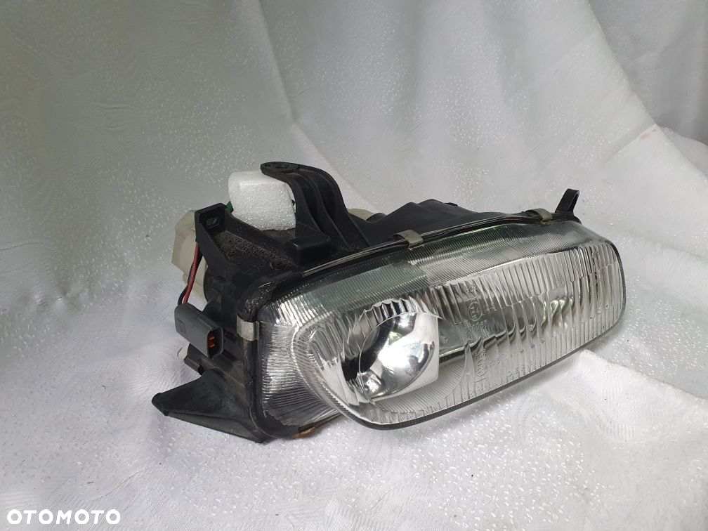 Lampa prawa mazda 323 Europa Soczewka - 2