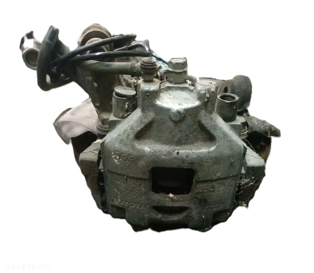 TOYOTA YARIS III 11-19 r. 1,4 D4D zacisk hamulcowy prawy przód * - 1