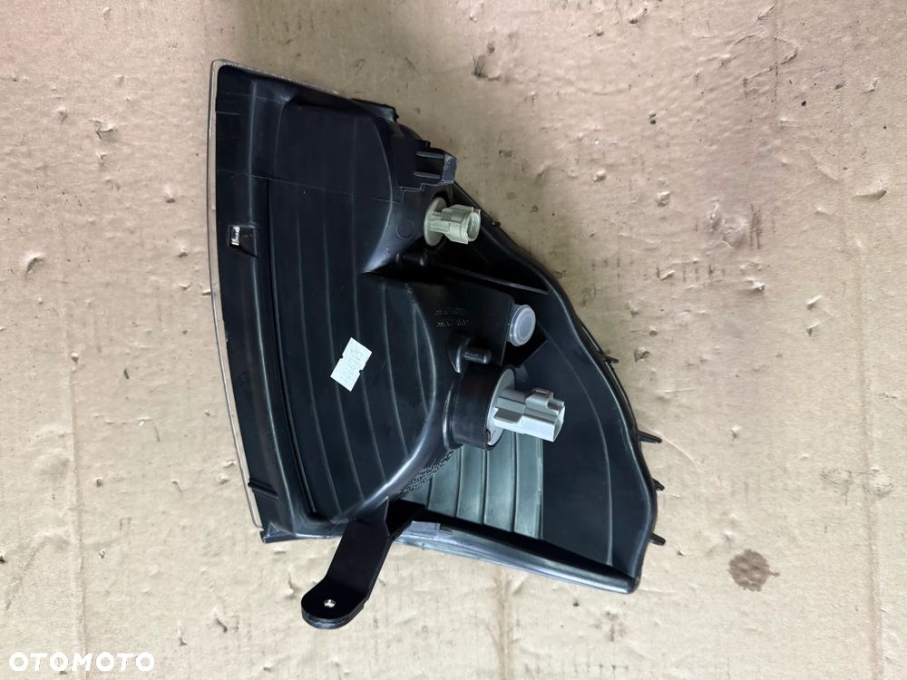 Reflektor / lampa przedni kierunkowskaz Toyota Land Cruiser 90 - lewa strona - oryginalna - 2