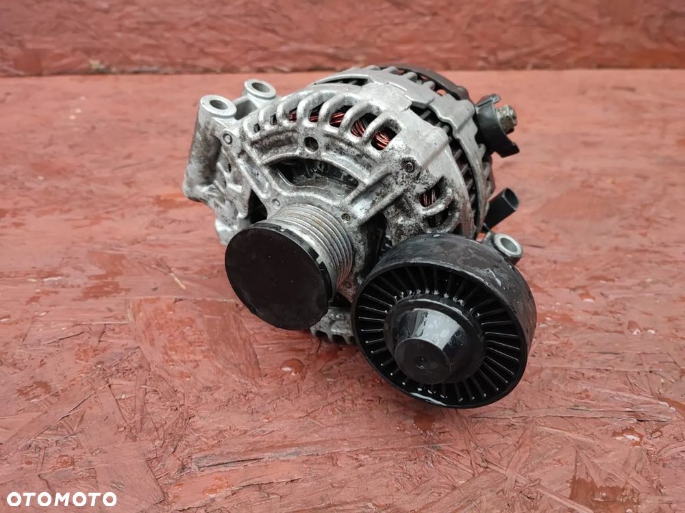 BMW E60 LCI / E61 LCI / E63 LCI / E64 LCI / E70 / E81 / E82 / E83 LCI / E84 / E87 LCI / E88 / E90 / E90 LCI / E91 / E91 LCI / E92 / E92 LCI / E93 / E93 LCI. ORYGINALNY ALTERNATOR DO SILNIKÓW N53 / N52 180A O NR: 7 551 254 / 7 555 926 OEM. 100% SPRAWNY TECHNICZNIE. - 1