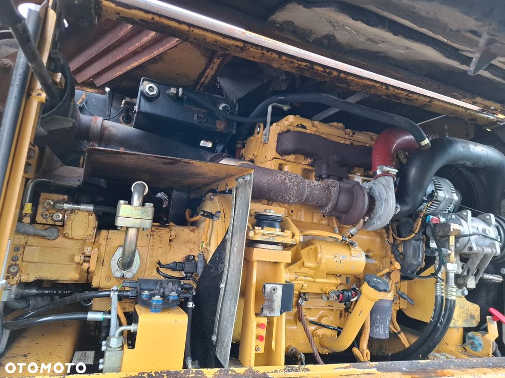 Caterpillar M313C - 12