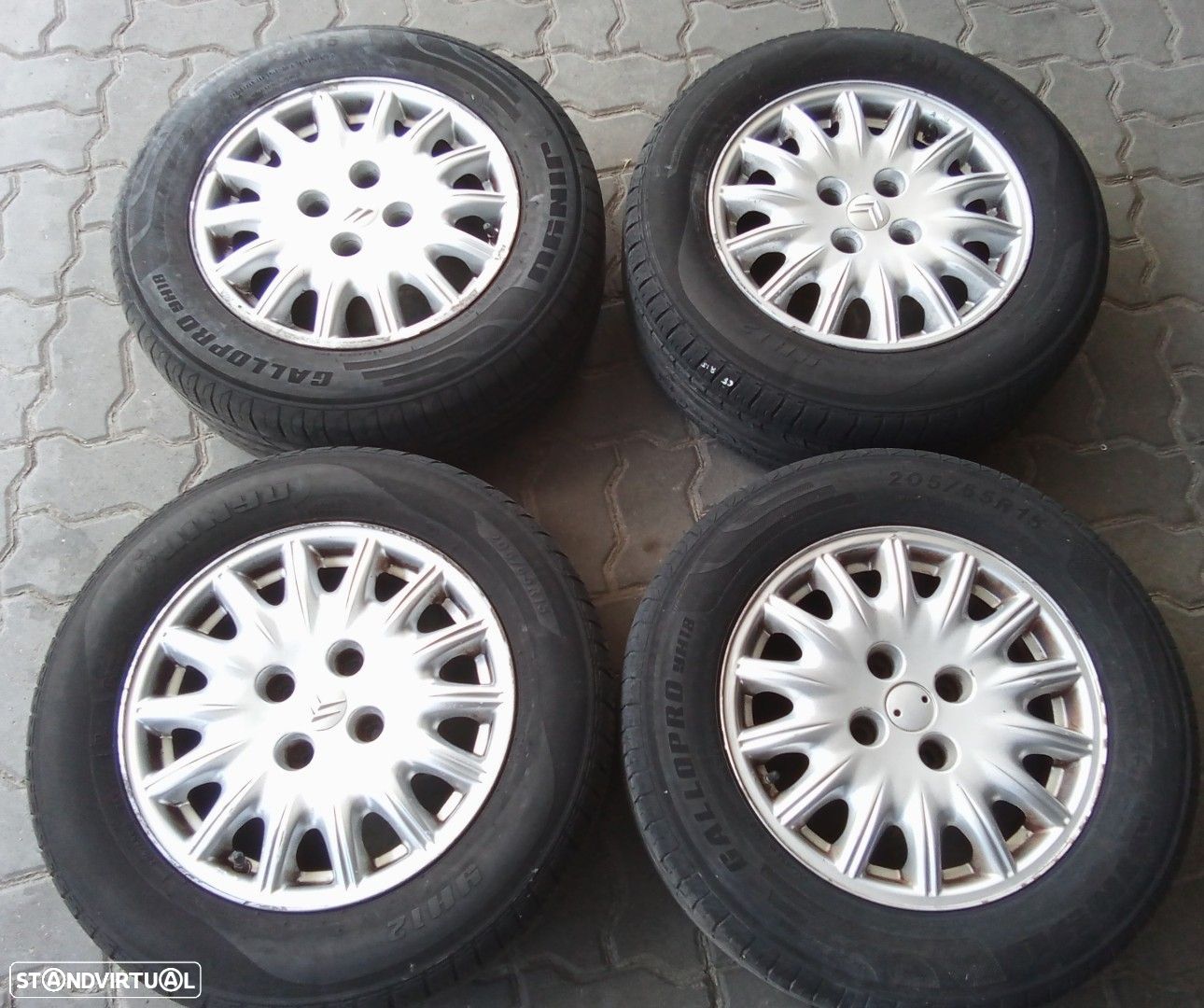 Jantes Citroen C5 R15 com pneus 205/65 furação 4x108 - 1