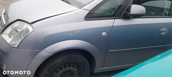 OPEL MERIVA A BŁOTNIK LEWY PRZEDNI PRZÓD nr. 9/6