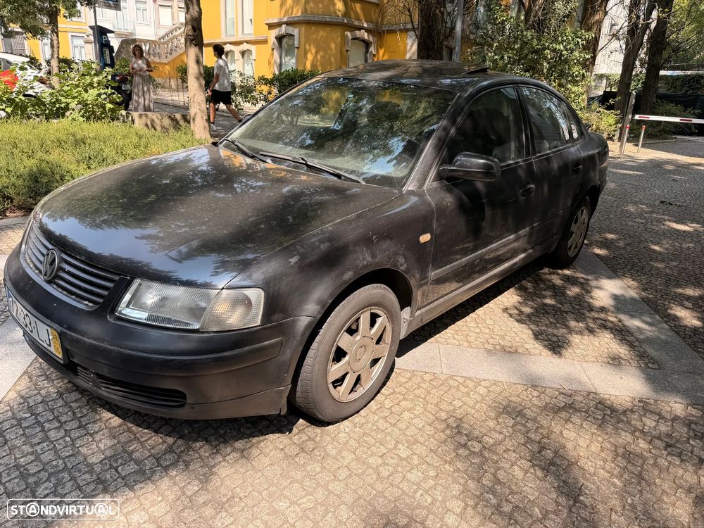VW Passat 1.9 TDi Confl. Top Aut. - 1