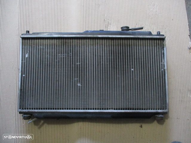 Radiador Agua OK2A1 1520X KIA SHUMA 1999 1.5 - 1