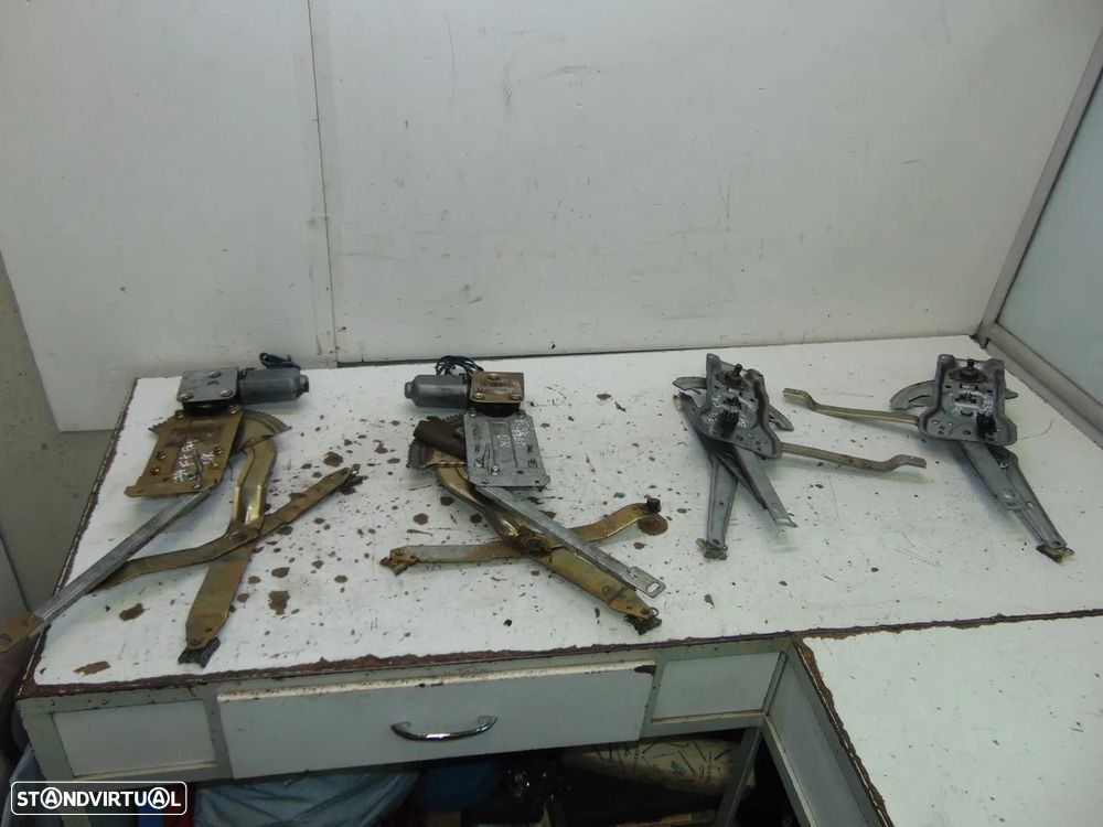 BMW E34 elevadores - 1