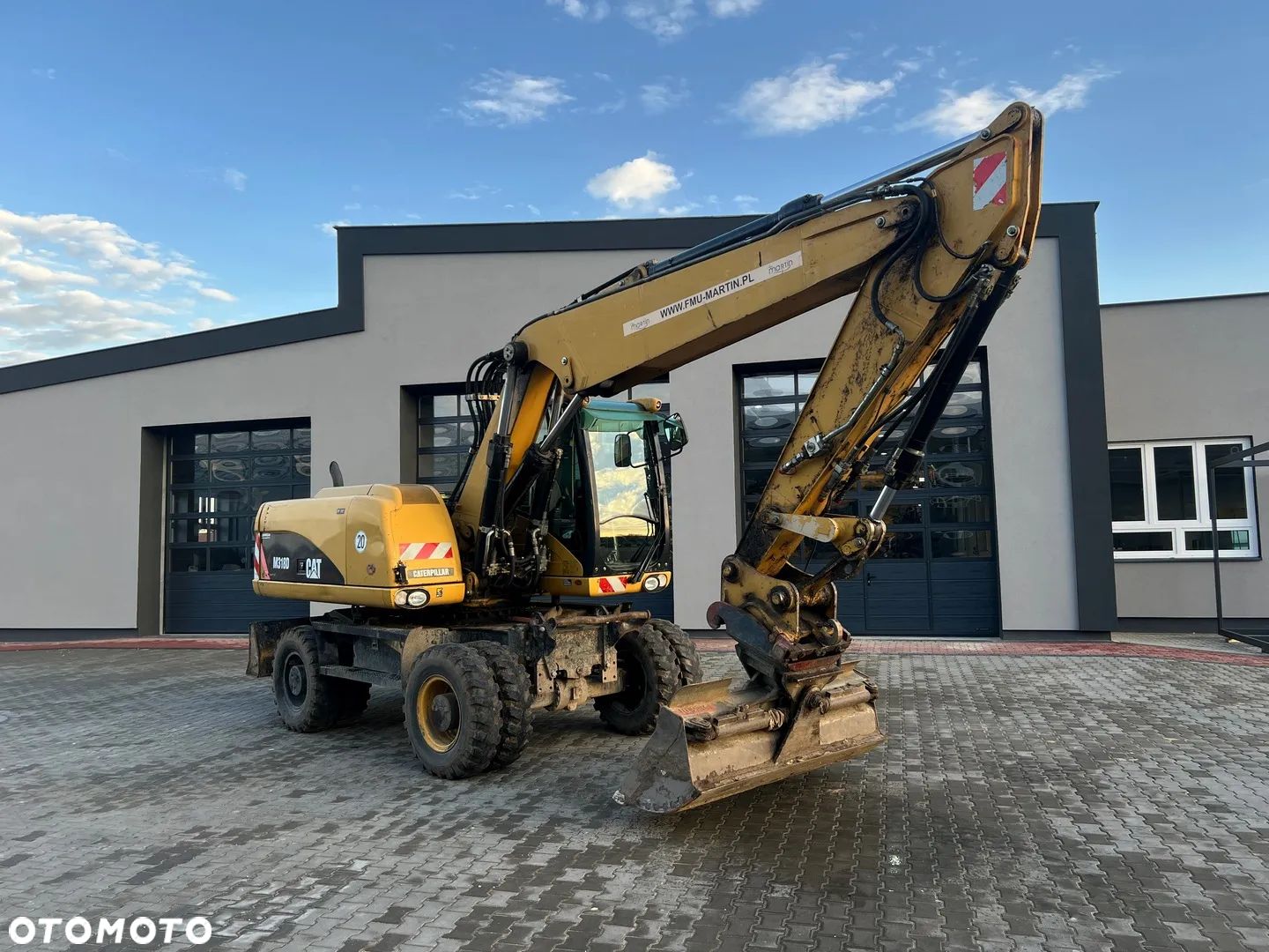 Caterpillar M318D - 1