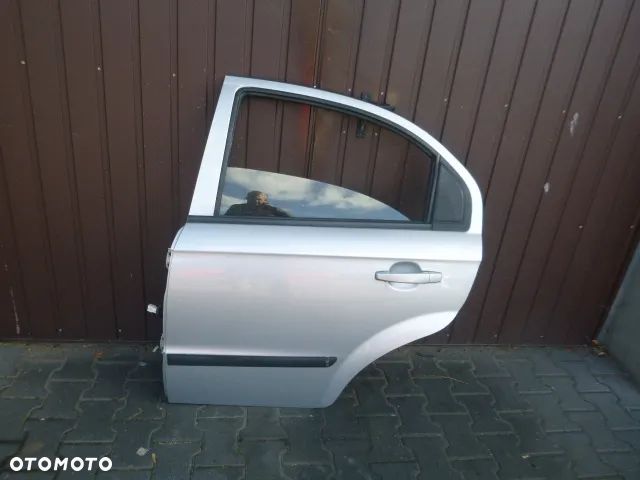 DRZWI LEWY TYŁ LEWE TYLNE CHEVROLET AVEO II T250 KOMPLETNE 05- - 11