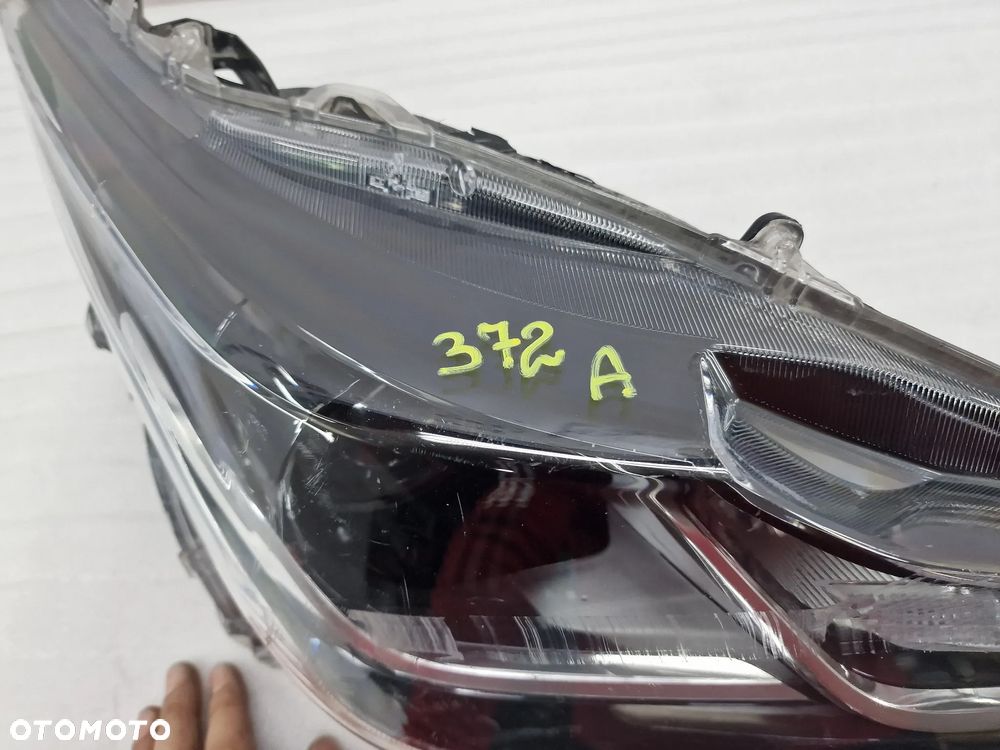 TOYOTA COROLLA E21 18- LEWA / PRAWA ZWYKŁA LAMPA PRZEDNIA PRZÓD SOCZEWKA , NR 81110-02T31-00 / 81150-02T31 / 81150-02T31-00 , NR AUKCJI LA372 - 2
