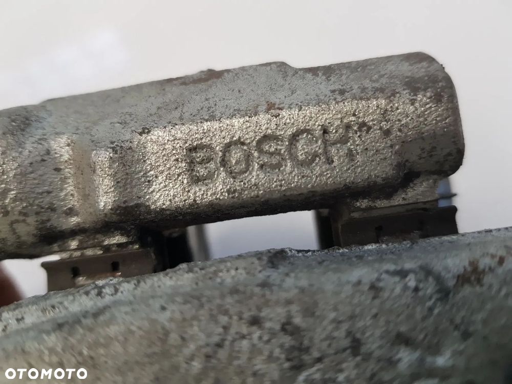 Zacisk hamulcowy jarzmo prawy przód OPEL CORSA D ADAM FIAT GRANDE PUNTO EVO PANDA 500 DOBLO FIORINO LINEA ALFA ROMEO MIT - 7