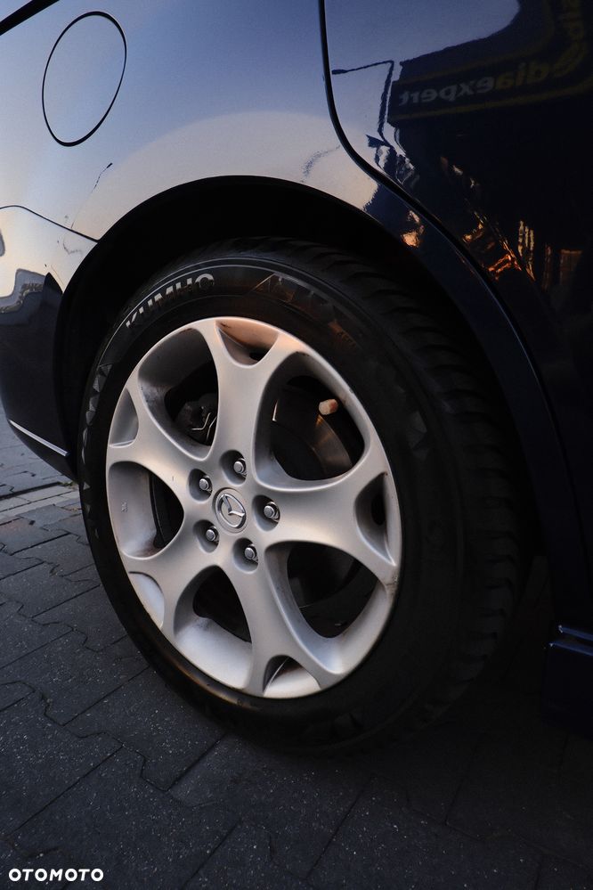 Mazda 5 2.0 Exclusive + - 9