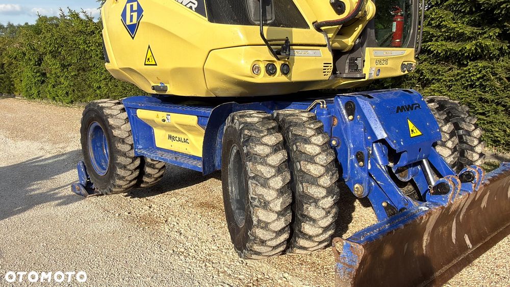 Mecalac Koparka 14 ton MECALAC 15 MWR koparko-ładowarka 3 łyżki widły 1 wł Centr.smarowanie Opony na BLIŹNIAKU 80%Camso ładowarka 714 12MTX 4x4 skrętne KLIMA kabina Premium silnik 146KM volvo EW140B DEUTZ szybka 35km/h - 20