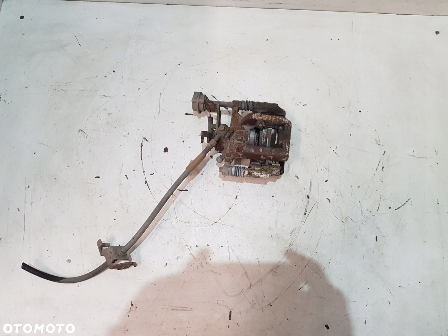 ZACISK HAMULCOWY LEWY TYŁ OPEL ASTRA J EU - 7