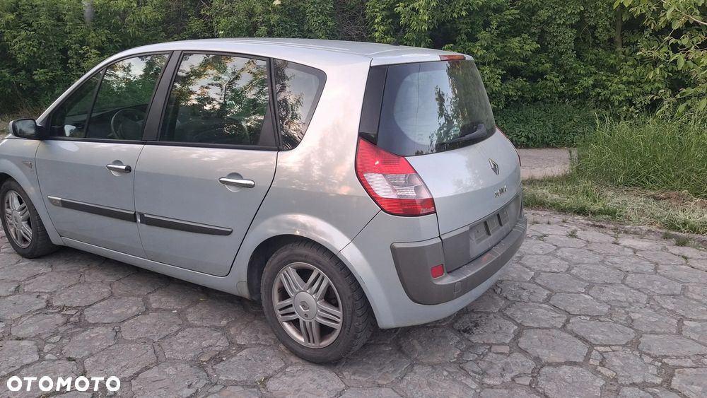 Na części Renault Scenic II silnik 1.6 16v K4M782 lakier MV632 skrzynia maska zderzak drzwi klapa szyba fotel kanapa lusterko lampa deska GWARANCJA !!! Przód Tył Zestaw Komplet Drzwi Klapa Zderzak Błotnik Maska Grill Atrapa Szyba Pas Lampa Lusterko Boczki Fotel Kanapa Kokpit Deska Rozdzielcza Przełącznik Włącznik Sterownik Przewody Wiązka Instalacja Moduł Komputer Czujnik Listwa Pompa Alternator Wtryski Głowica Rozrusznik Kompresor Sprzęgło Dwumas Silnik  Skrzynia ABS Klimatyzacji Paliwa Wspomagania Kolektor Turbina Przepustnica Zawór Chłodnica Koło Hak Belka Sanki Zawieszenie Mcpherson Półoś Amortyzator Wydech Tłumik Zacisk - 5