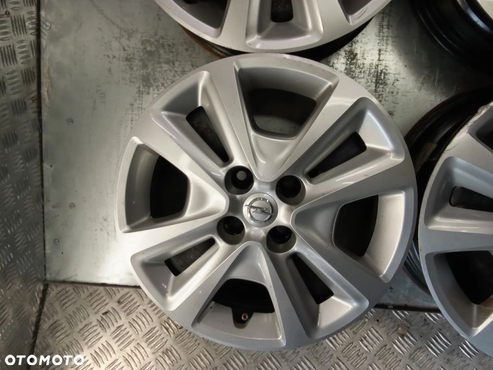 Felgi strukturalne Opel Adam Corsa D E Karl 6Jx15 et39 4x100 - 5