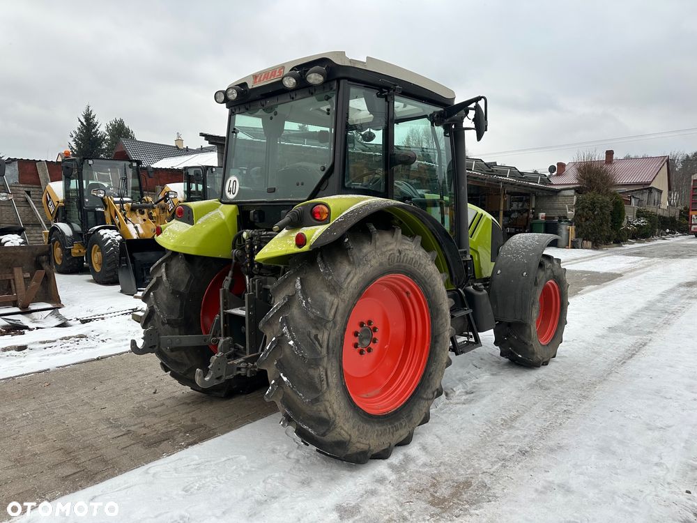 Claas Axos 320 - 5