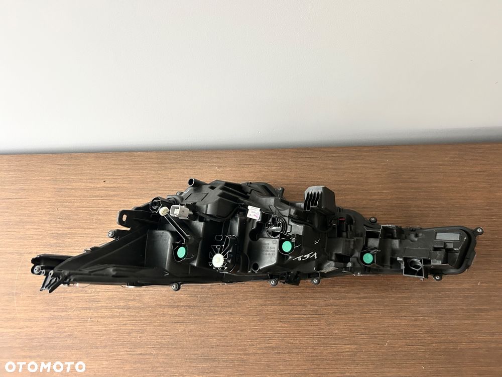 TOYOTA COROLLA E21 LAMPA PRZÓD PRZEDNIA PRAWA 81110-02S60 90119224 - 2