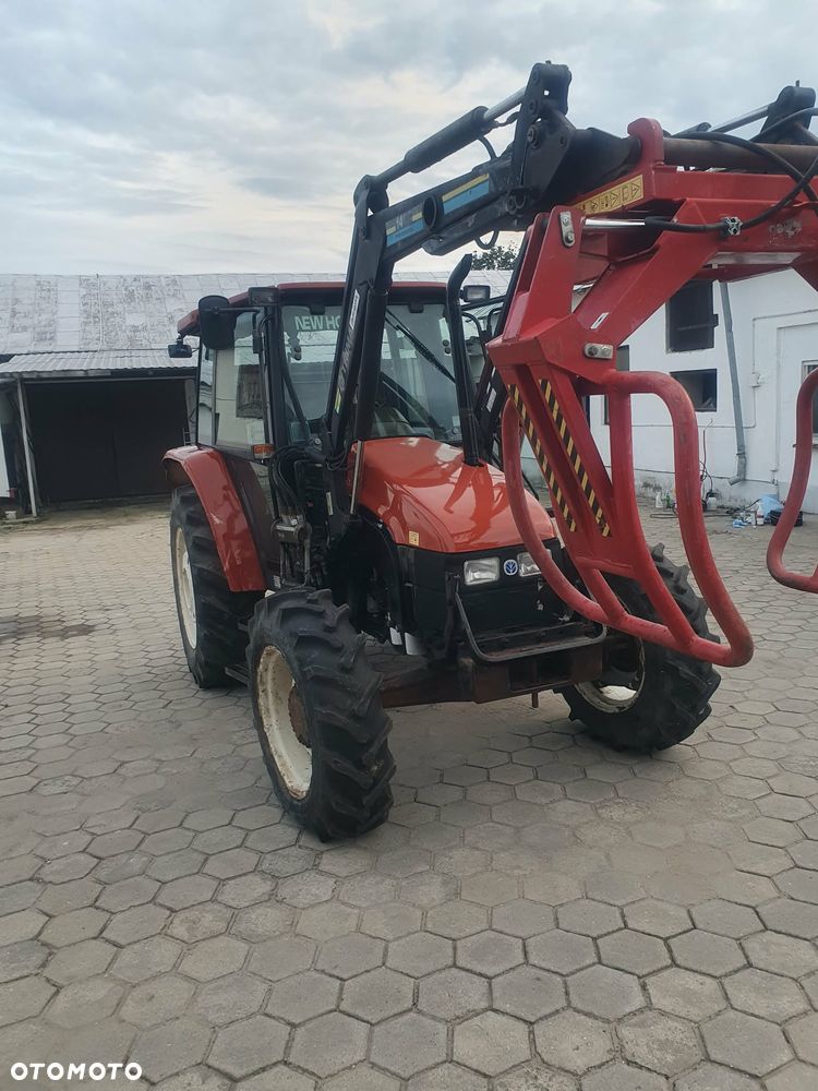 New Holland L65 DT z turem - 2