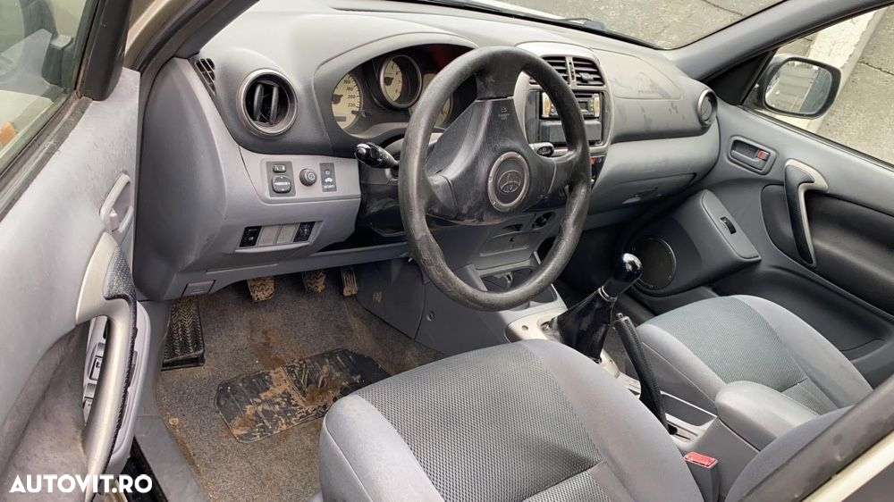piese toyota rav 4 2001 motor cod 1AZ-FE benzină cutie manuala bara fata capota far aripa roti Haion luneta geam planetară diferențial grup cutie transfer dezmembrez model pe benzină 150 Hp - 3