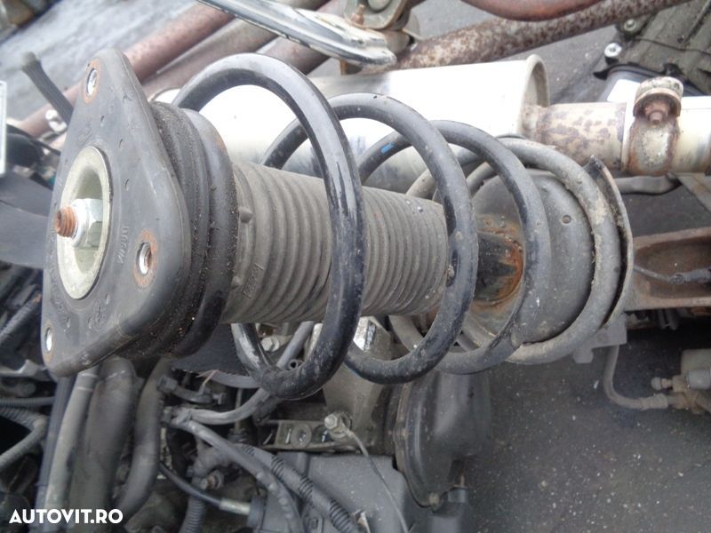 Vand  fata dreapta-stanga amortizor arc ford focus2 1.6i 120ron/buc - 2