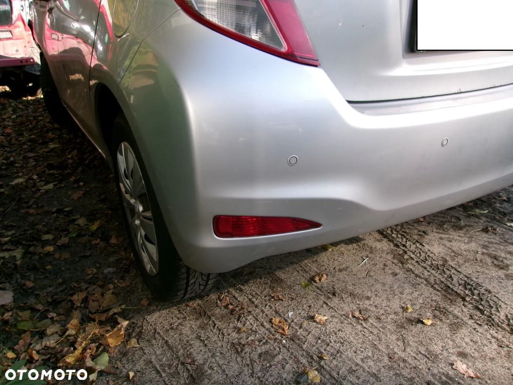 ZDERZAK TYŁ TOYOTA YARIS III  11-14  1F7 - 4