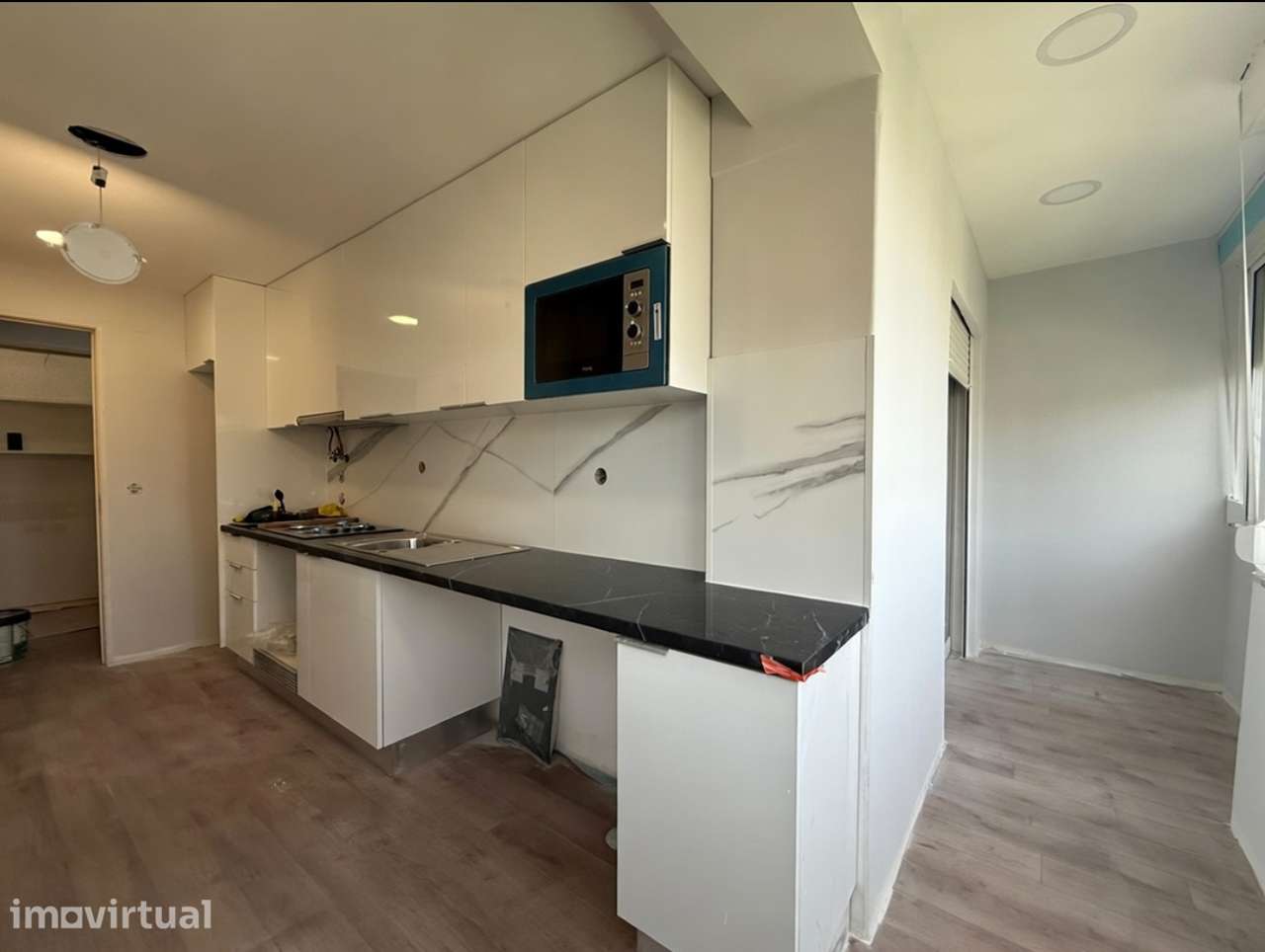 Apartamento T4 transformado em T3 no Laranjeiro, Almada - Grande imagem: 3/33