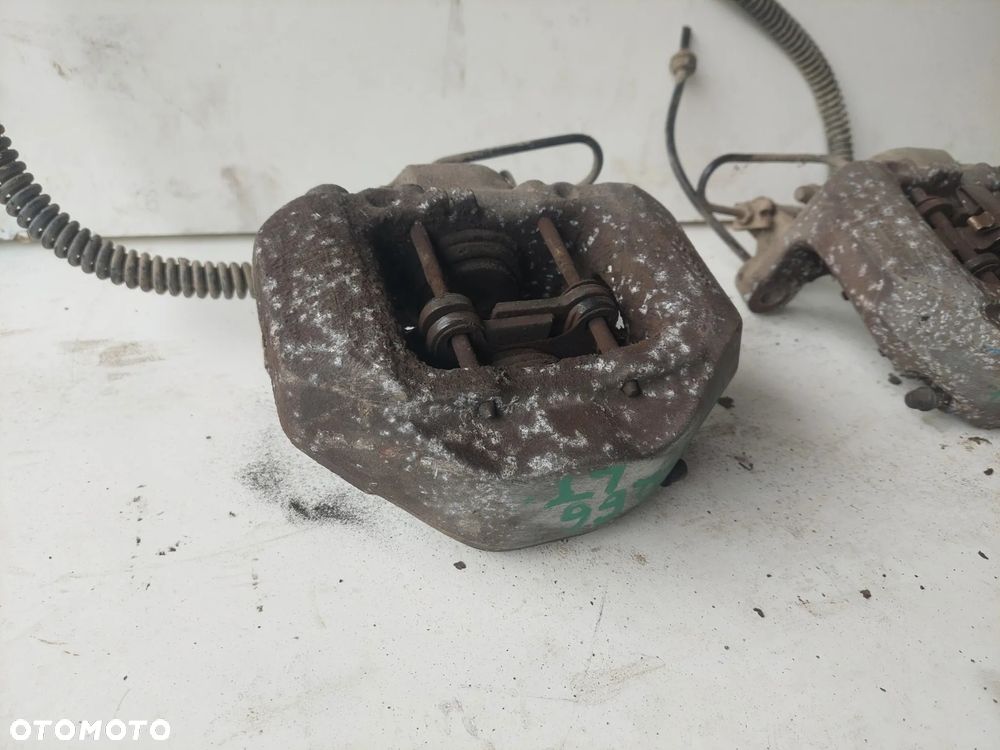 ZACISK HAMULCOWY LEWY PRAWY TYŁ VOLKSWAGEN TOUAREG 7L 3.0TDI - 3