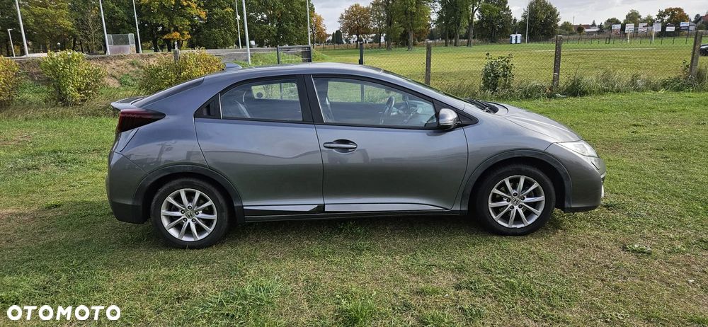 Honda Civic 1.4 i-VTEC Comfort - 11