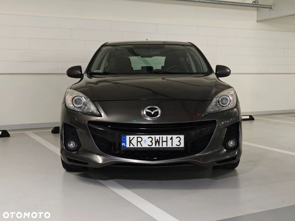 Mazda 3 2.0 MZR DISI Sports-Line - 2