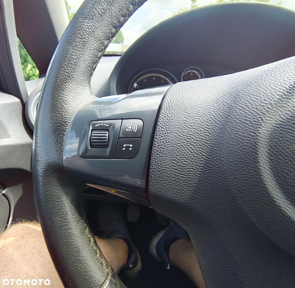 Opel Corsa 1.4 16V Cosmo - 21