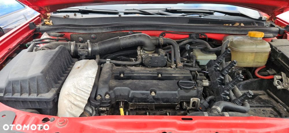 OPEL ASTRA H III KOMBI 04-06 1.4 90KM RADIOODTWARZACZ RADIO - 24