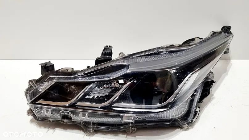 REFLEKTOR LEWY LAMPA SOCZEWKA TOYOTA COROLLA E21 SEDAN EUROPA - 2