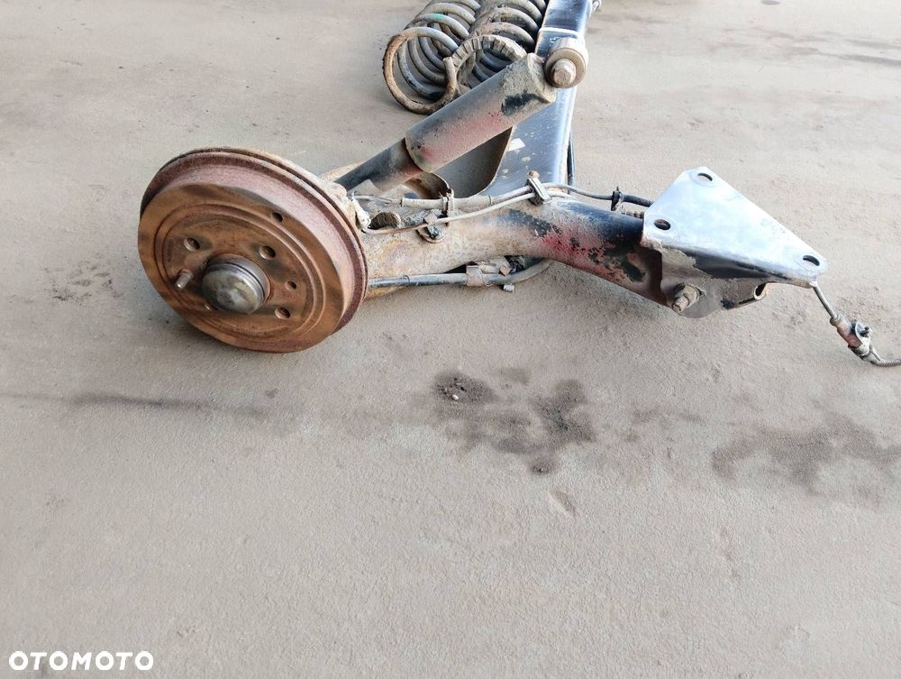 BELKA OŚ ZAWIESZENIA TYŁ BĘBNY Z ABS FIAT PANDA II - 4