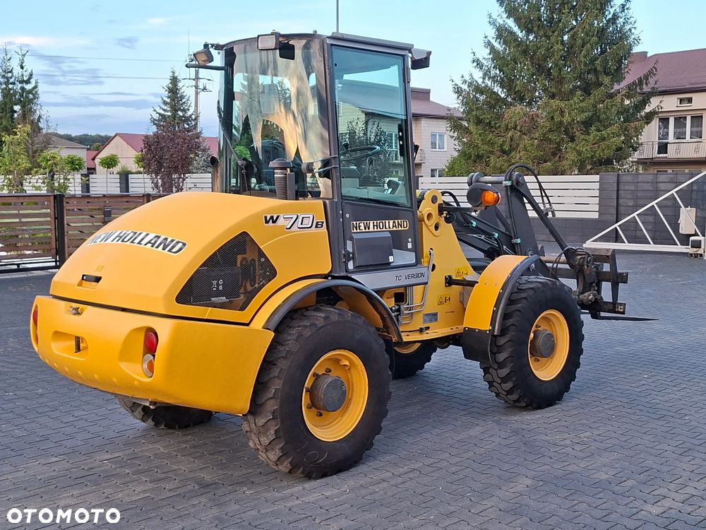 New Holland W70B z Niemiec Łyżka otwierana+Widły - 1