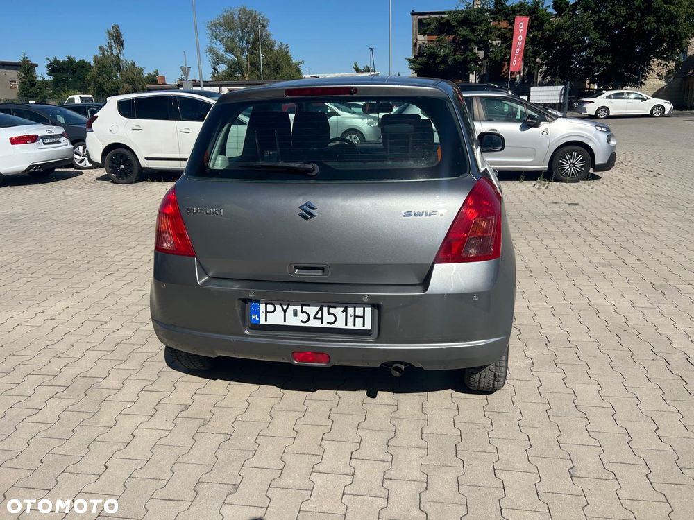 Suzuki Swift 1.3 Club - 7