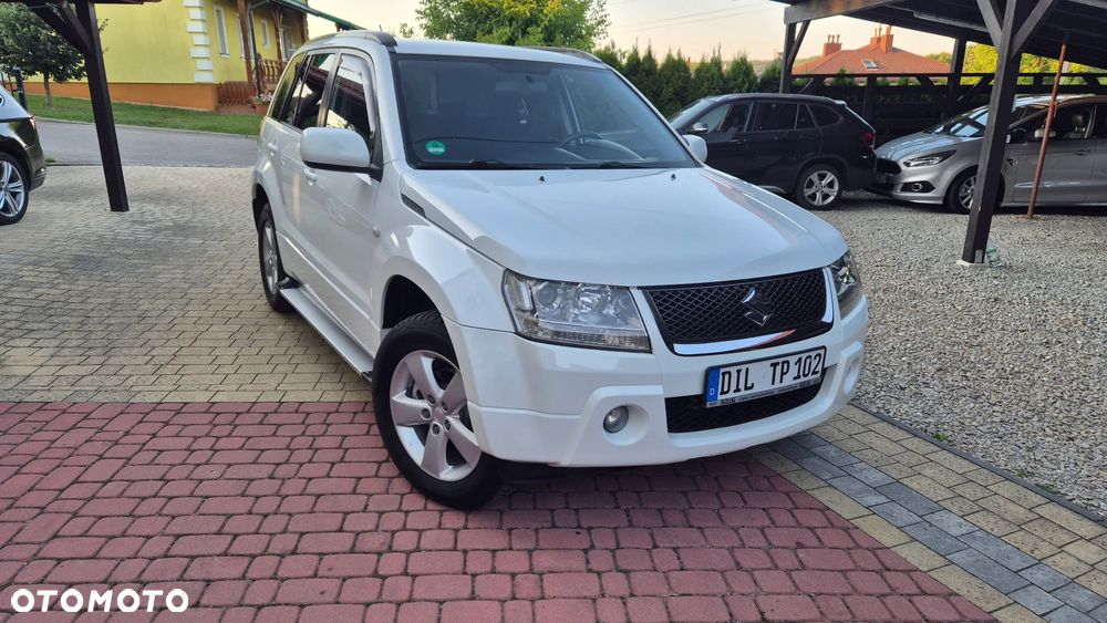 Suzuki Grand Vitara 2.0 Comfort + Family - 1