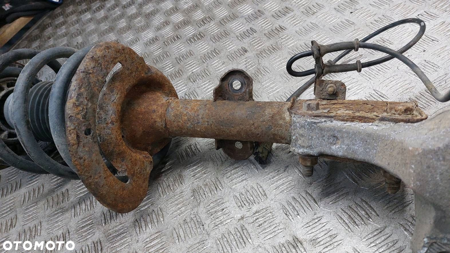 AMORTYZATOR SPRĘŻYNA ZWROTNICA LEWY PRZÓD MCPERSON  PACIFICA 3.5 V6 - 2