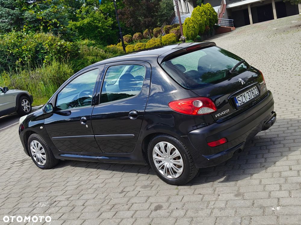 Peugeot 206 plus 1.1 Presence Euro5 - 34